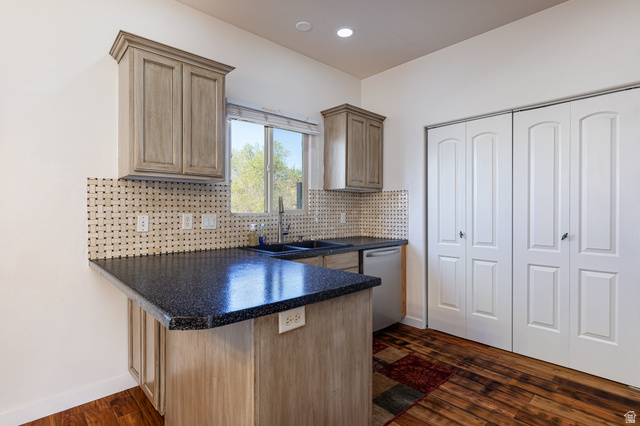 6 300th Road North, Unit I6 Kanab, UT 84741 - Photo 13 of 37 Kitchen with a peninsula, dishwasher, dark wood finished floors, decorative backsplash, and recessed lighting