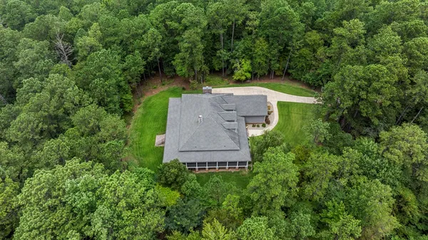an aerial view of a house with a garden