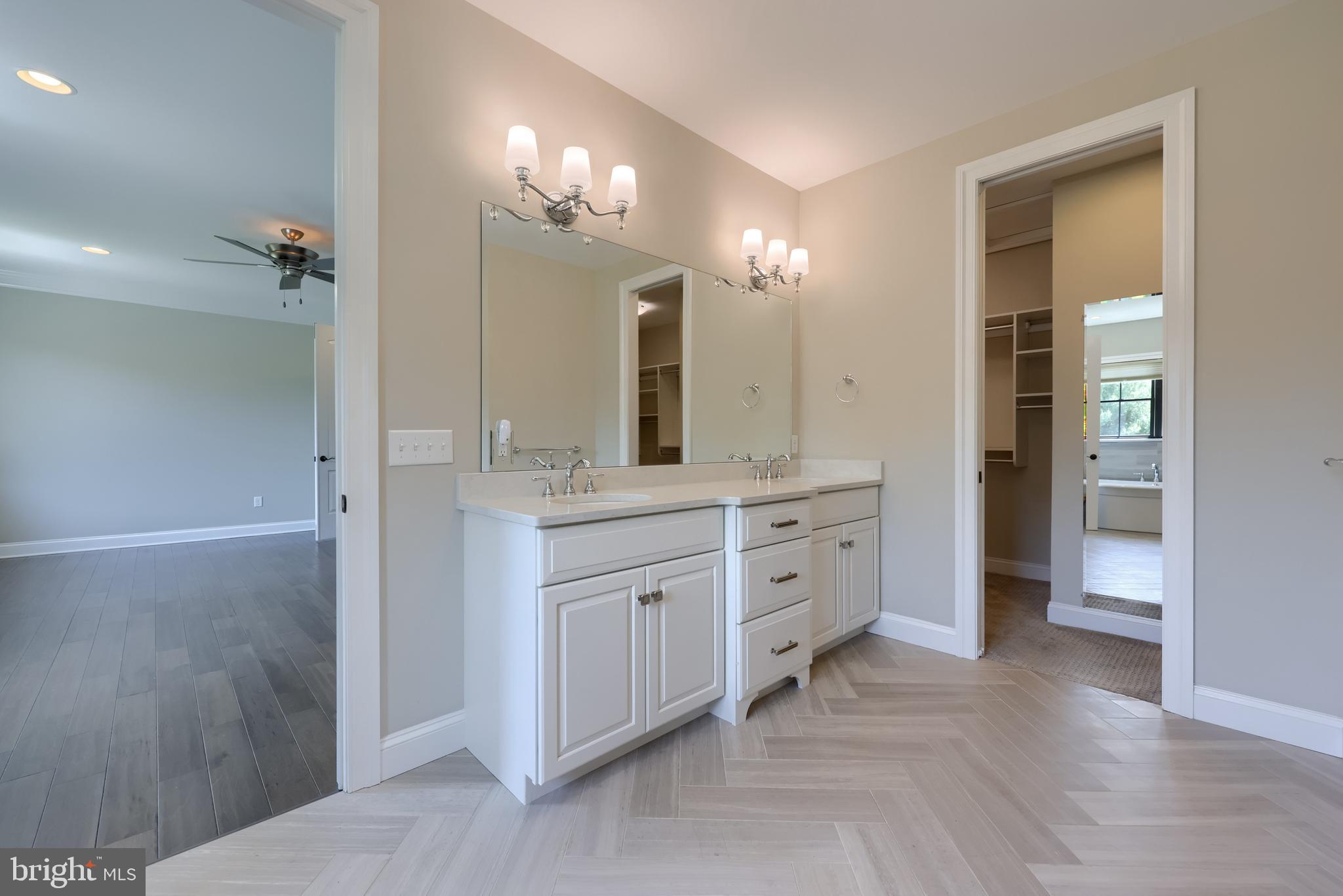 428 Southampton Drive Lititz, PA 17543 - Photo 37 of 60 a spacious bathroom with a granite countertop sink a mirror and a shower