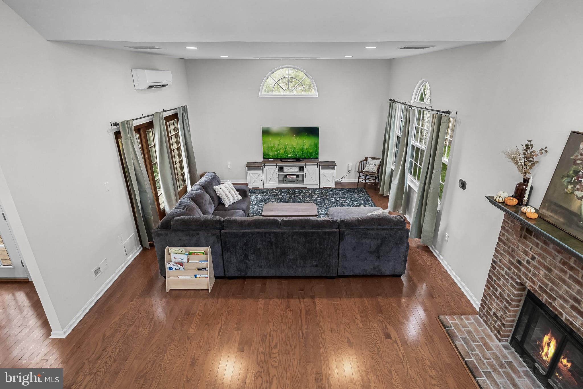 5 Hampton Court Mount Laurel, NJ 08054 - Photo 16 of 46 a living room with furniture and a flat screen tv