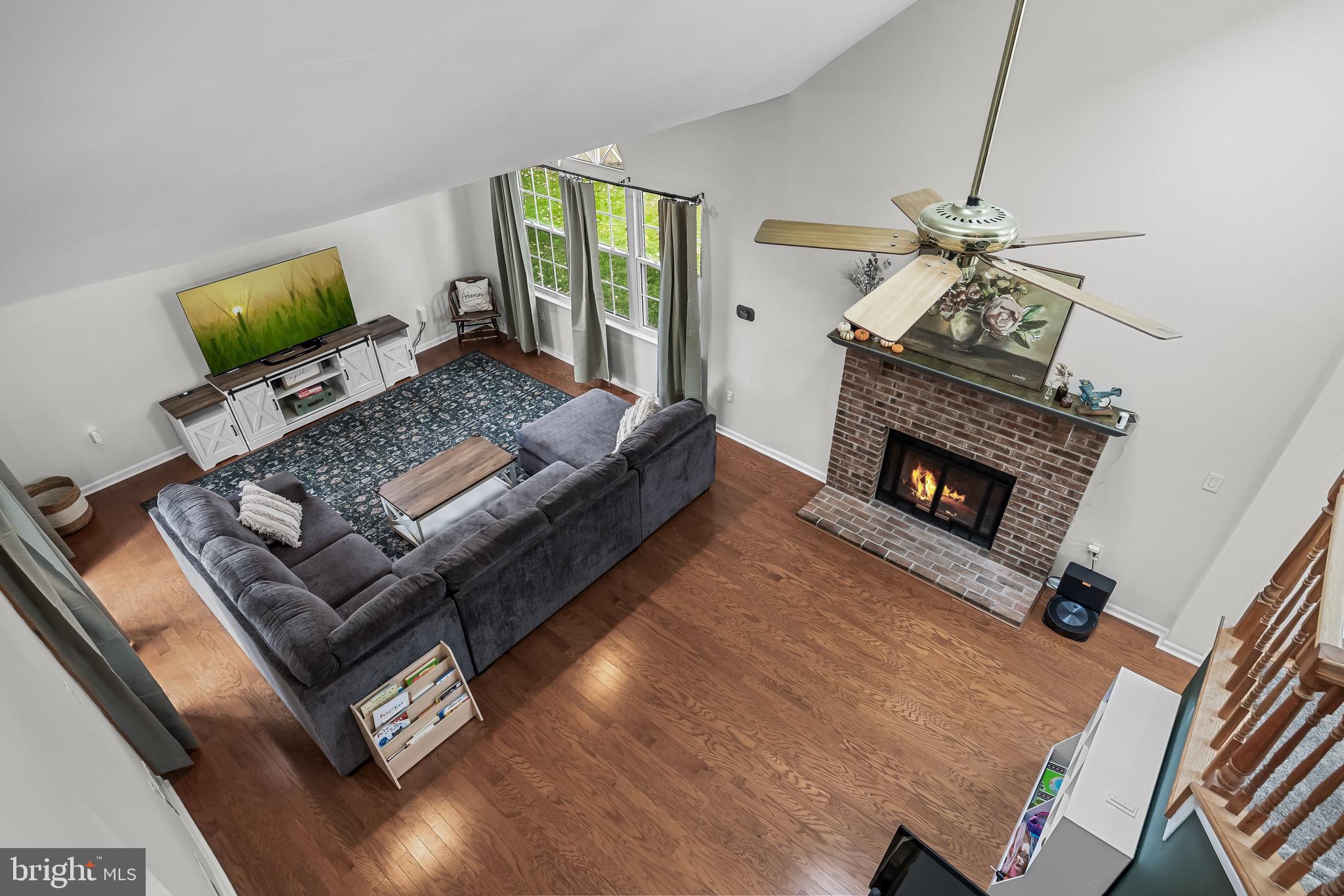 5 Hampton Court Mount Laurel, NJ 08054 - Photo 17 of 46 a living room with furniture and a fireplace