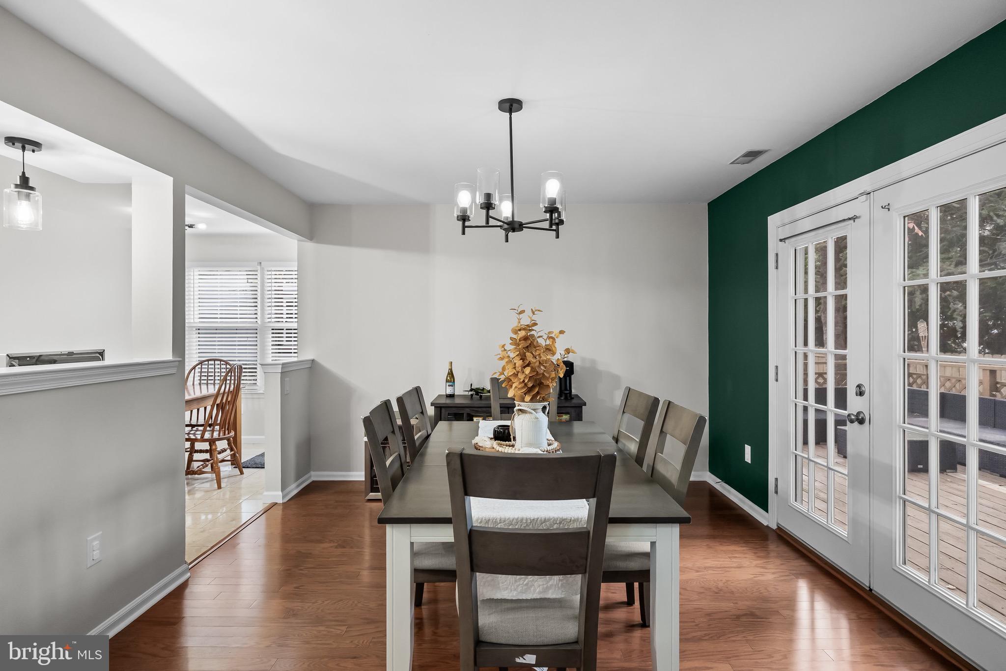 5 Hampton Court Mount Laurel, NJ 08054 - Photo 18 of 46 a dining room with furniture a chandelier and wooden floor
