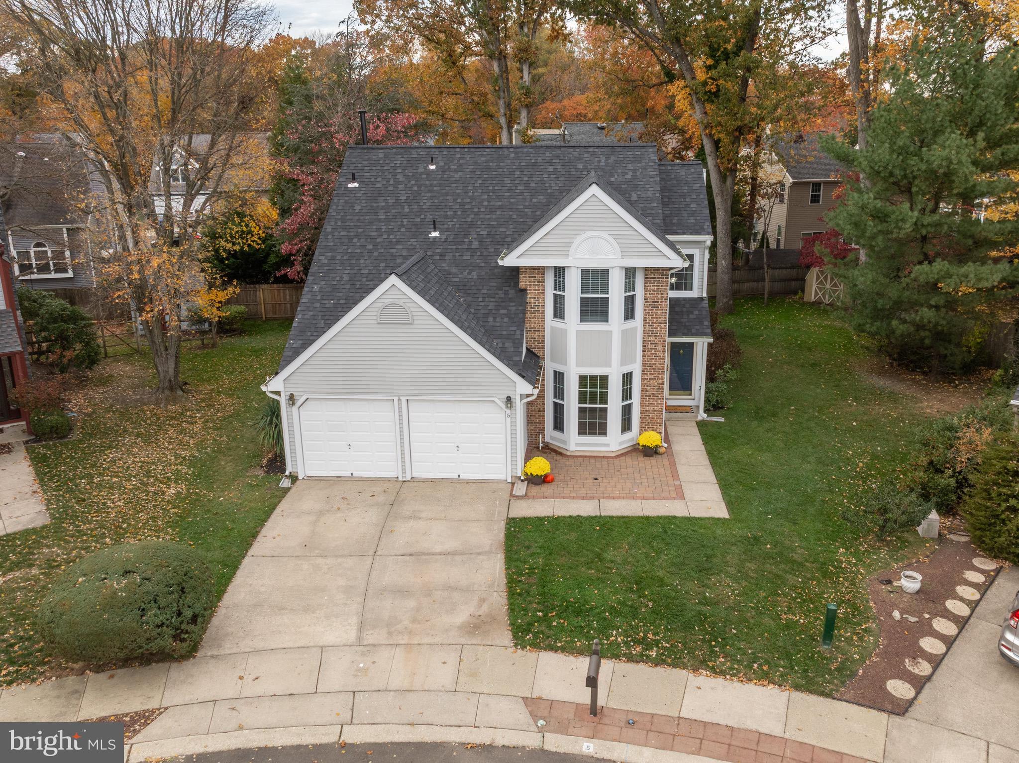 5 Hampton Court Mount Laurel, NJ 08054 - Photo 2 of 46 a view of house with garden