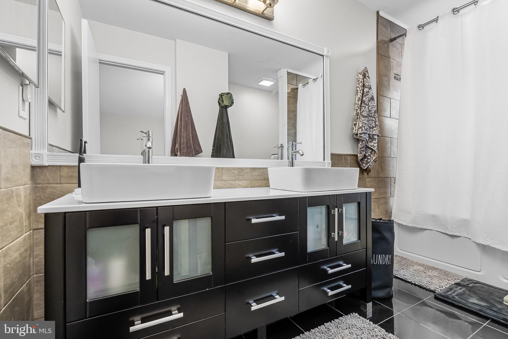 5 Hampton Court Mount Laurel, NJ 08054 - Photo 28 of 46 a bathroom with a sink a vanity and a large mirror