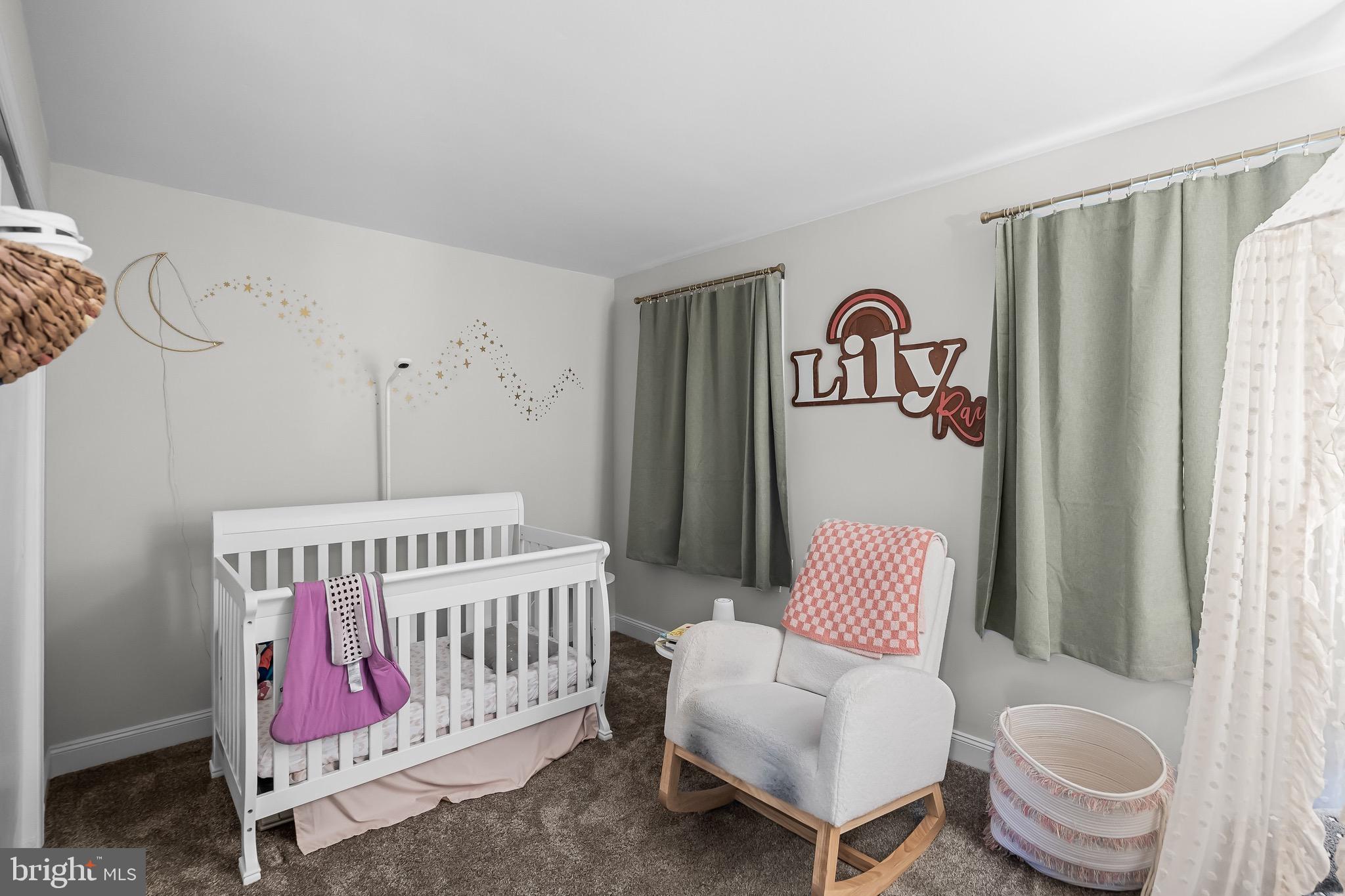 5 Hampton Court Mount Laurel, NJ 08054 - Photo 30 of 46 a bedroom with a bed and a couch