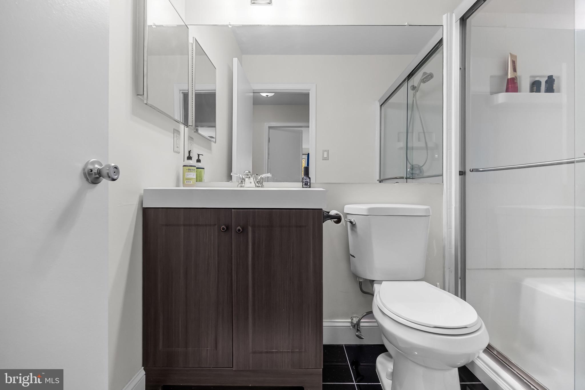 5 Hampton Court Mount Laurel, NJ 08054 - Photo 31 of 46 a bathroom with a sink a toilet and a mirror