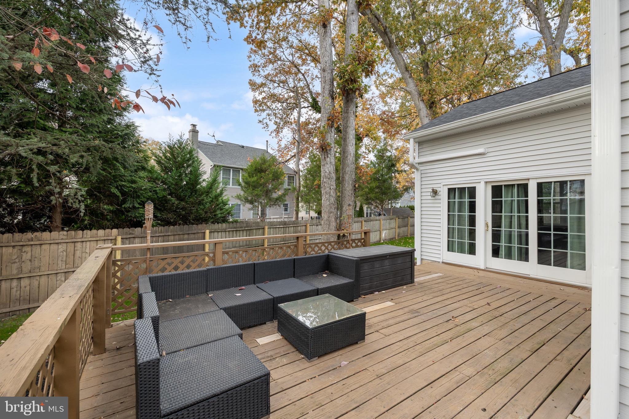 5 Hampton Court Mount Laurel, NJ 08054 - Photo 33 of 46 a view of a roof deck with couches and wooden floor