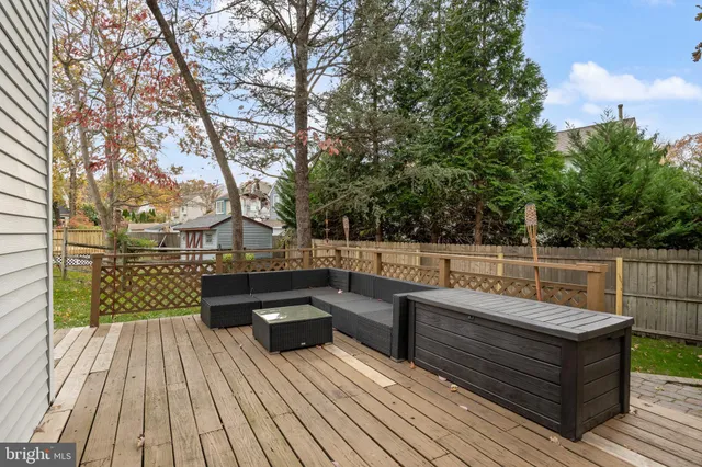 a view of backyard with sitting area