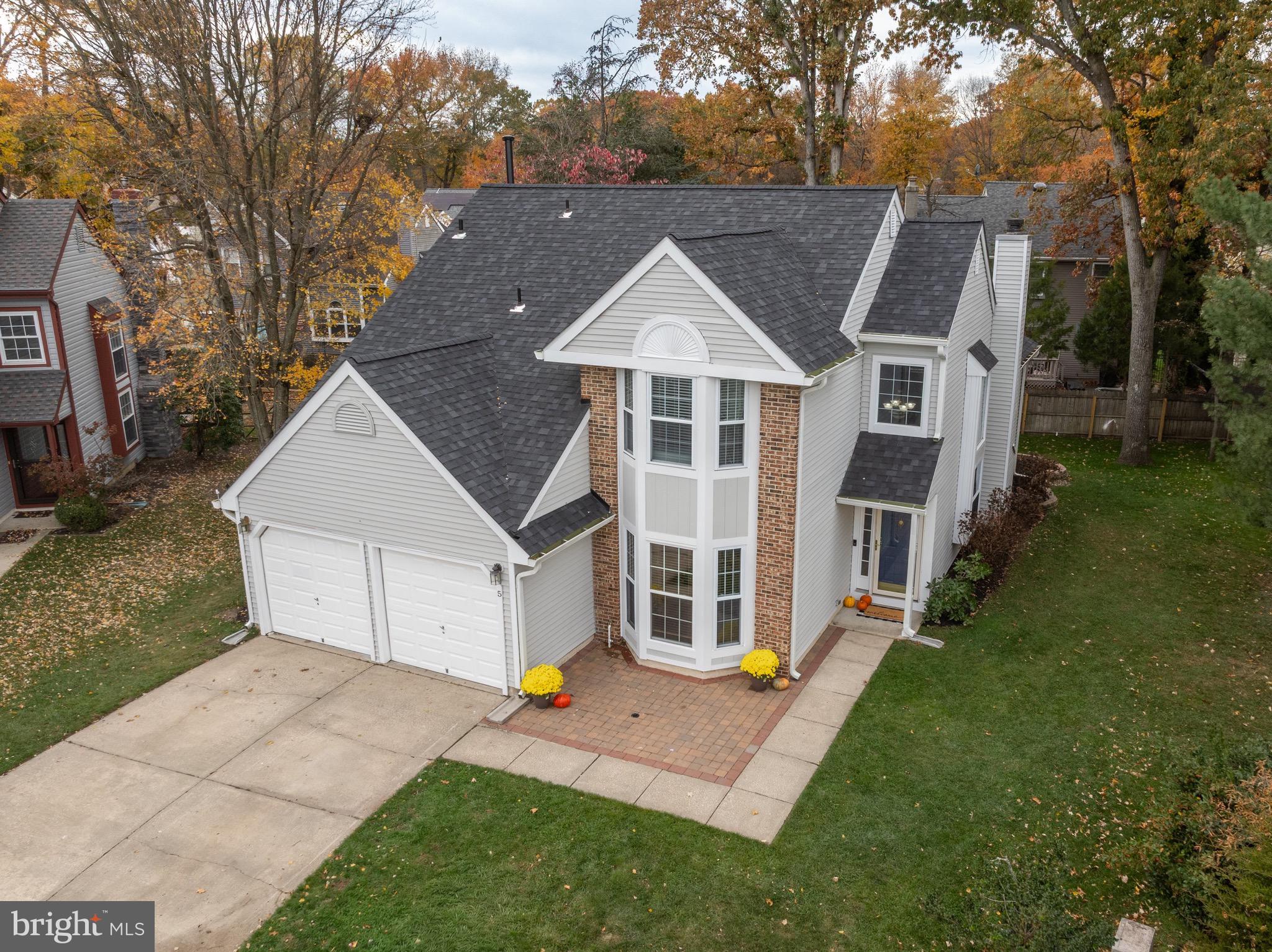 5 Hampton Court Mount Laurel, NJ 08054 - Photo 37 of 46 a aerial view of a house with a yard and large trees