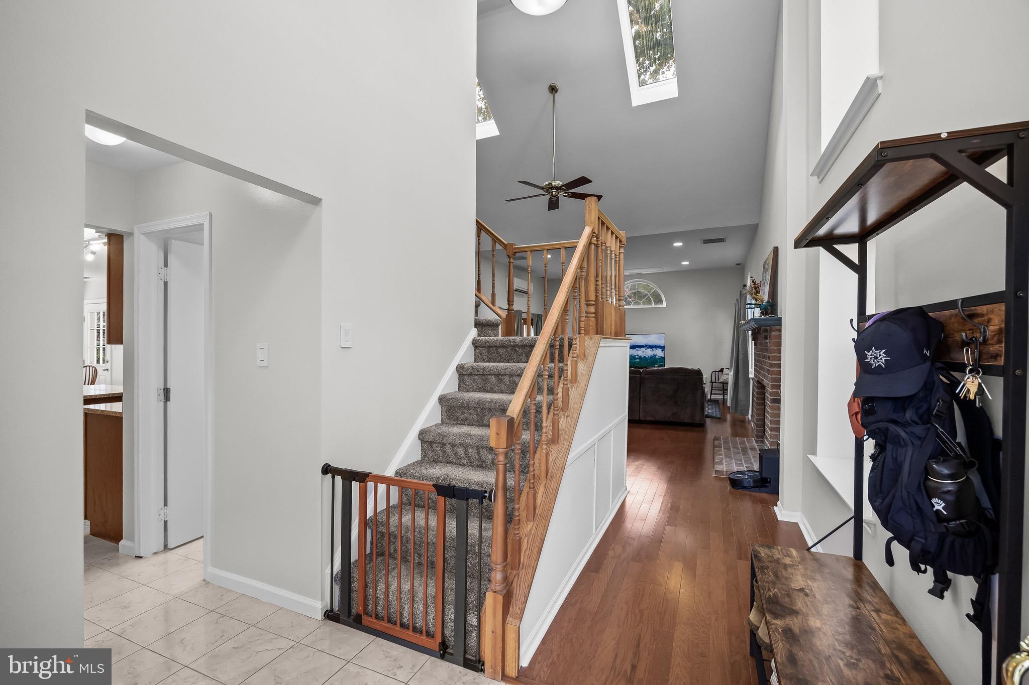 5 Hampton Court Mount Laurel, NJ 08054 - Photo 5 of 46 a view of an entryway with workspace and stairs