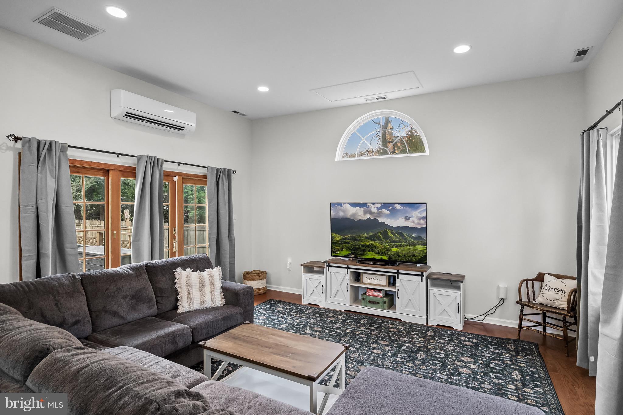5 Hampton Court Mount Laurel, NJ 08054 - Photo 10 of 46 a living room with furniture and a flat screen tv