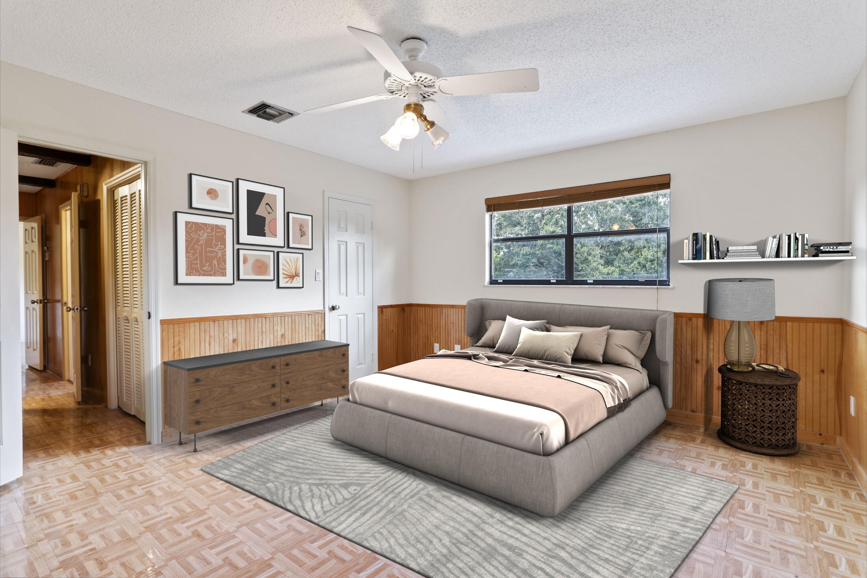 8791 Hidden Pines Road Fort Pierce, FL 34945 - Photo 35 of 55 a bedroom with a large bed and a window