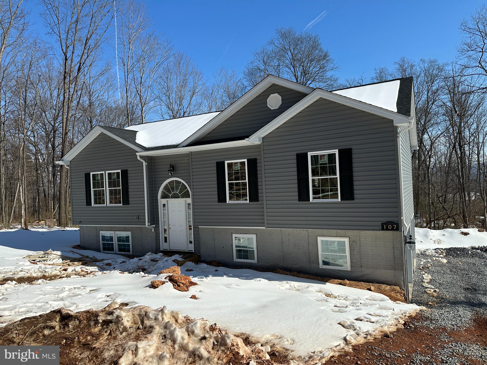 107 Pinto Trail Winchester, VA 22602 - Photo 1 of 32 a front view of a house with a yard