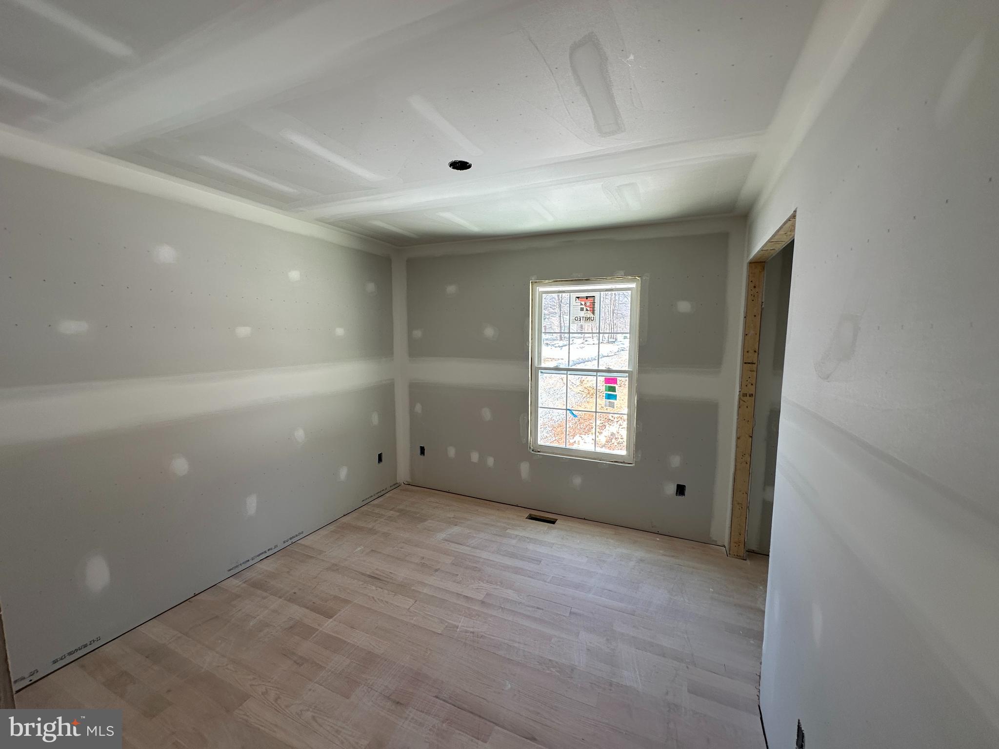 107 Pinto Trail Winchester, VA 22602 - Photo 18 of 32 a view of an empty room with a window