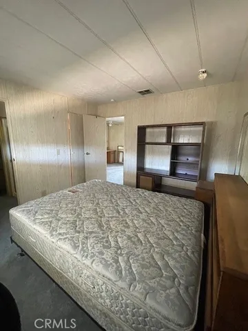 a view of a room with rack on the wall