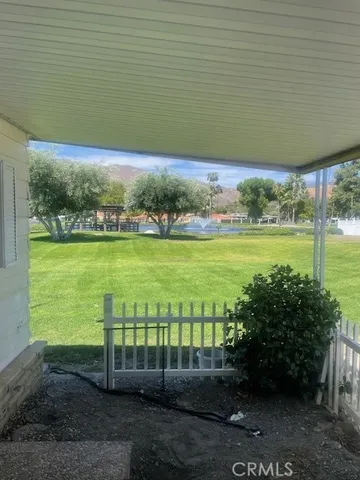 a view of an ocean with a swimming pool