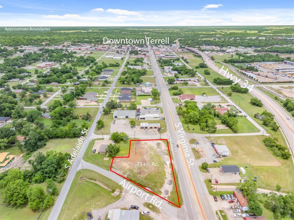 1008 South Virginia Street Terrell, TX 75160 - Photo 1 of 22 a view of city with tall buildings