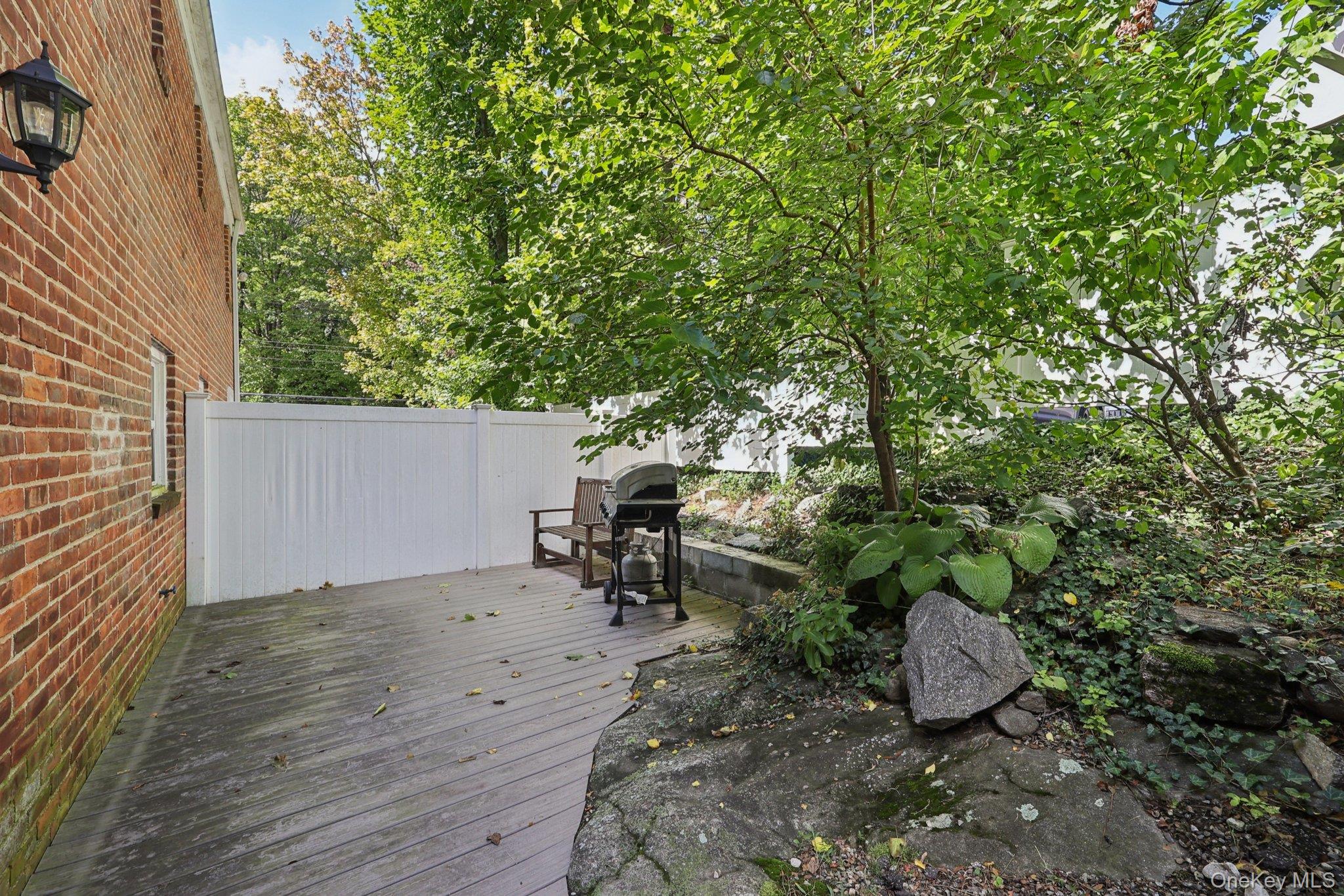 24 Wappanocca Avenue, Unit B Rye, NY 10580 - Photo 13 of 14 a view of a backyard with sitting area