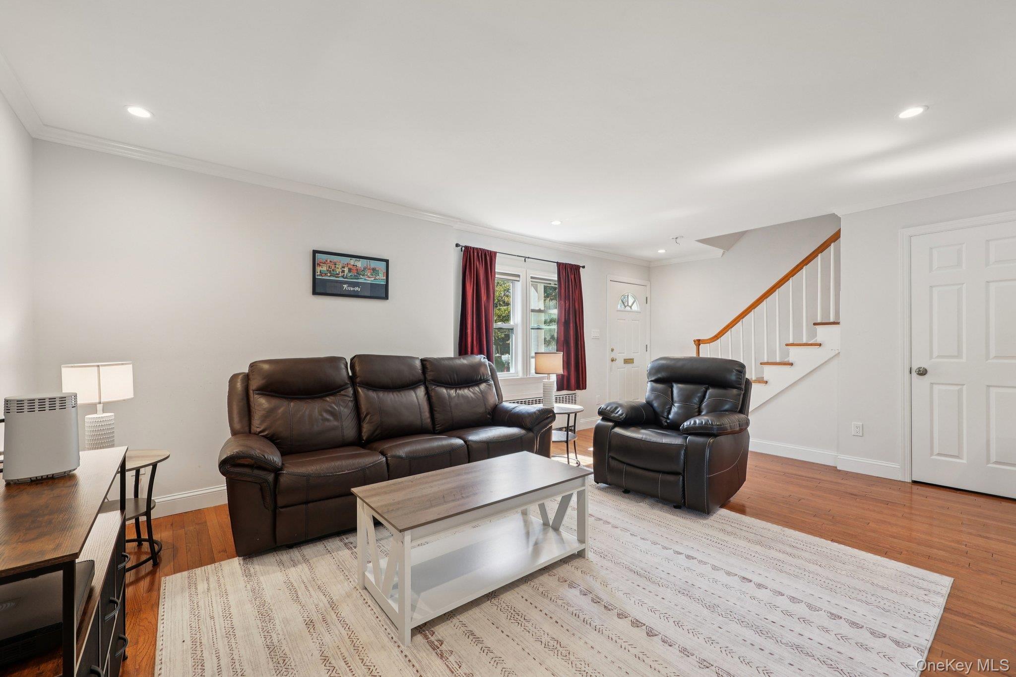 24 Wappanocca Avenue, Unit B Rye, NY 10580 - Photo 4 of 14 a living room with furniture and a wooden floor