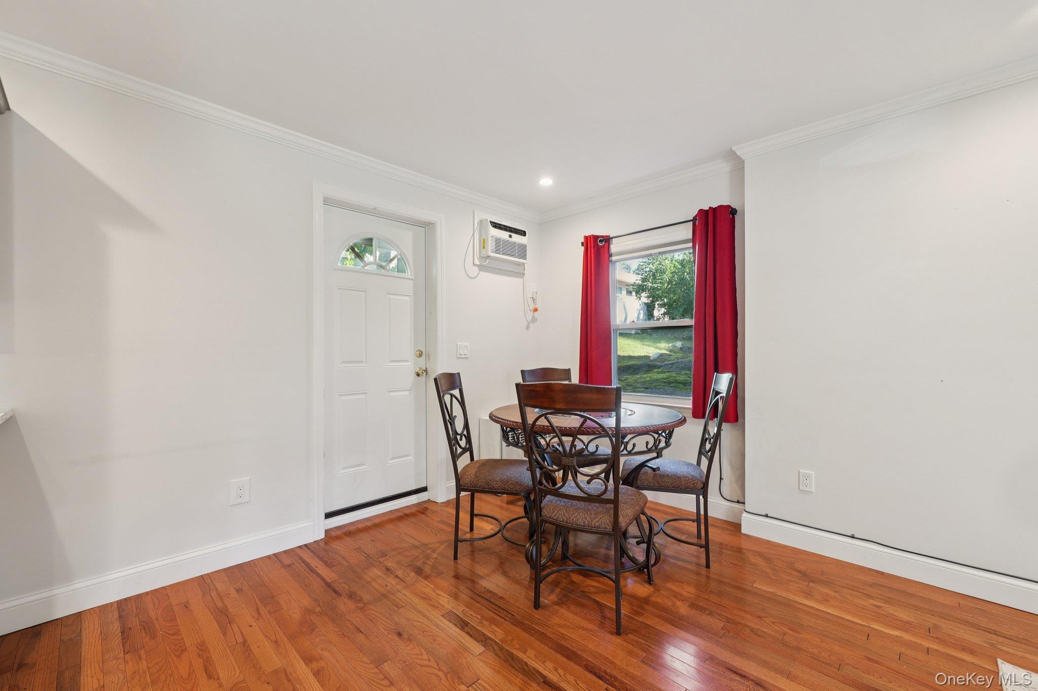 24 Wappanocca Avenue, Unit B Rye, NY 10580 - Photo 5 of 14 a view of a dining room with furniture and wooden floor