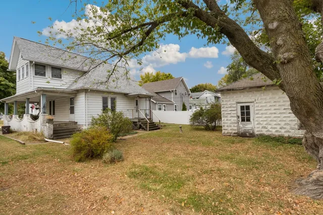 a view of a yard in front of a house