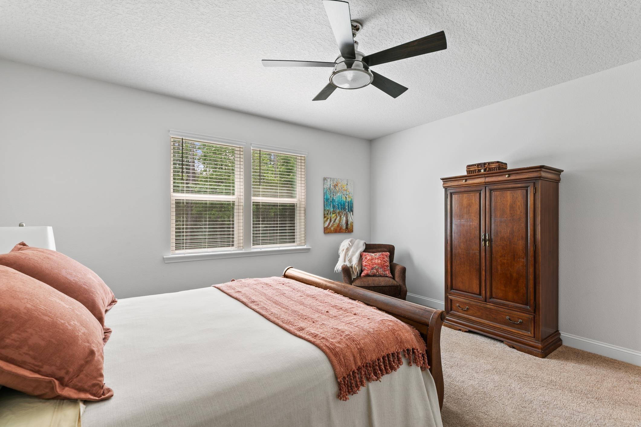 345 Downs Corner Road St. Augustine, FL 32092 - Photo 21 of 38 a bedroom with a bed and a window