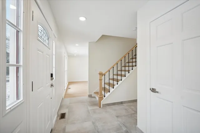 a view of an entryway with stairs