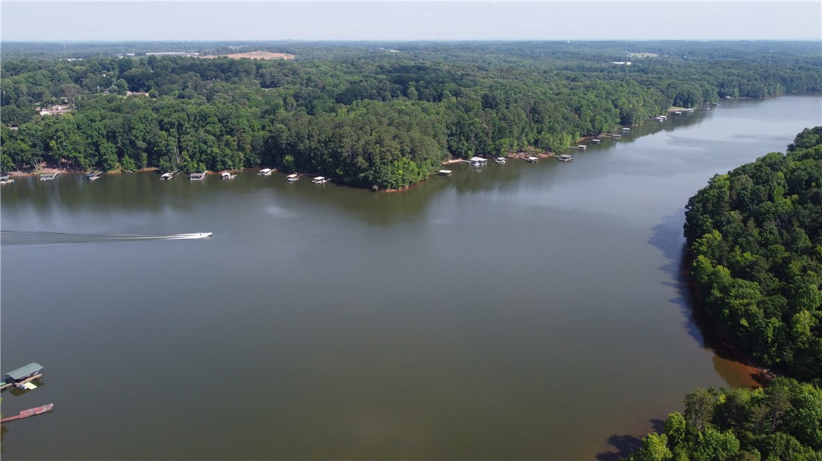 Lot 5 Little Creek Road Anderson, SC 29621 - Photo 3 of 3 This tranquil waterfront setting provides direct lake access and picturesque tree-lined shores.
