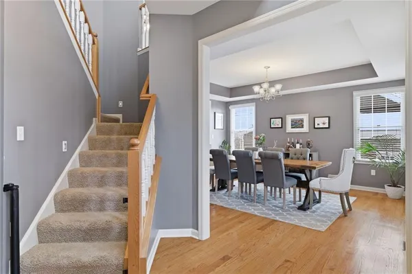 a view of a living room and entryway