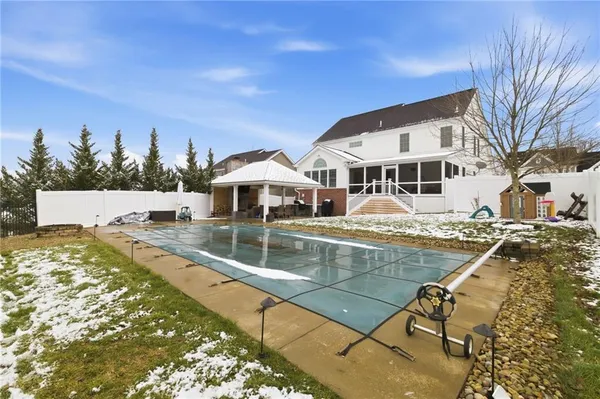 aerial view of a house with swimming pool