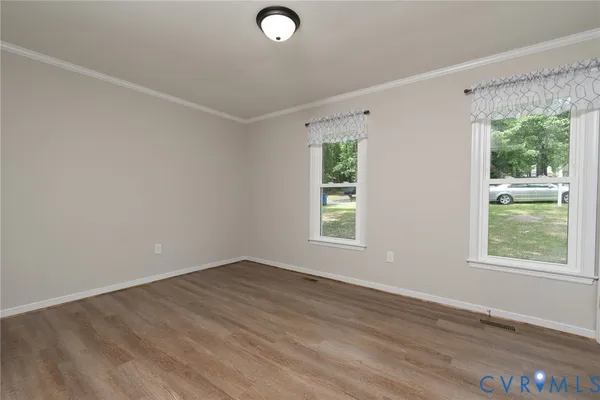 an empty room with windows