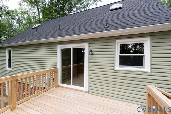 a view of a house with deck