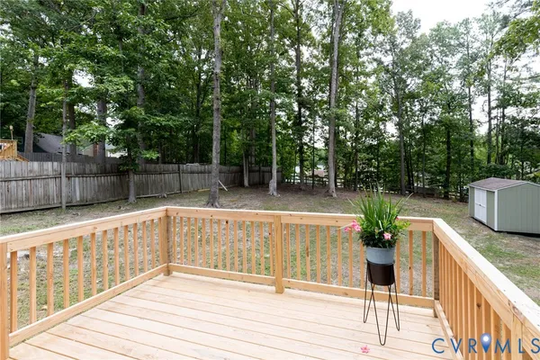 swimming pool view with a seating space