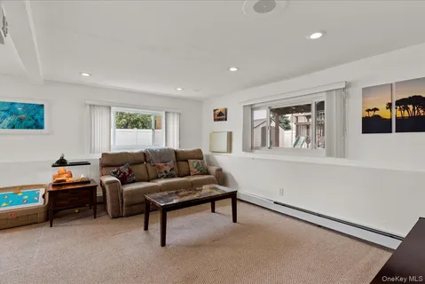 a living room with furniture and a window