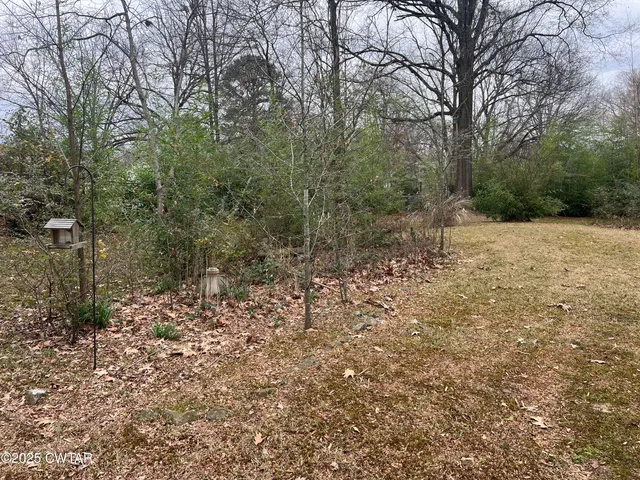 a car parked in front of a house