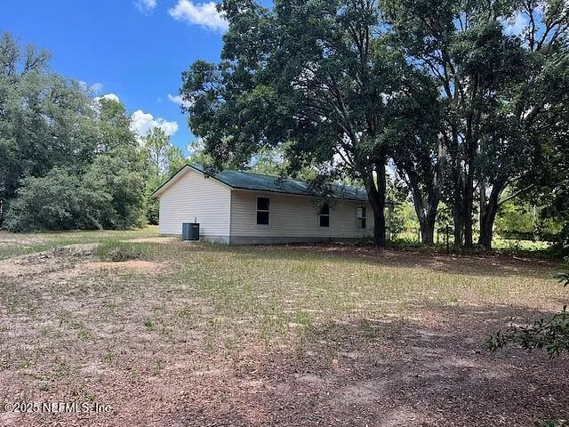a backyard of house with green space