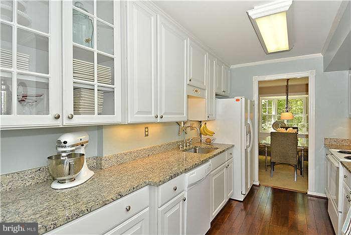 11720 Dry River Court Reston, VA 20191 - Photo 4 of 30 Sleek Granite Counters & Crisp White Cabinets