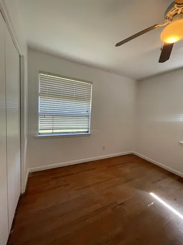 a view of a room that has a window in it
