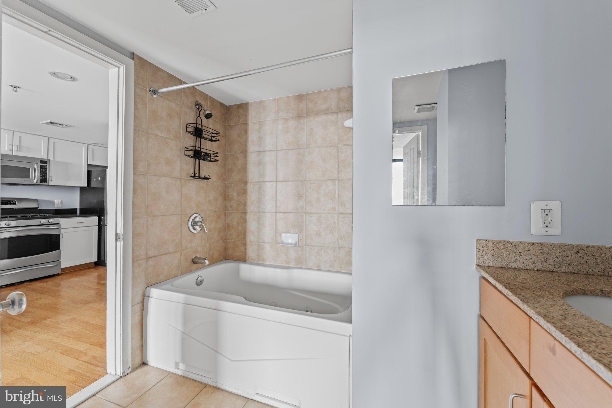 414 Water Street, Unit 1306 Baltimore, MD 21202 - Photo 26 of 29 Modern bathroom with elegant finishes.