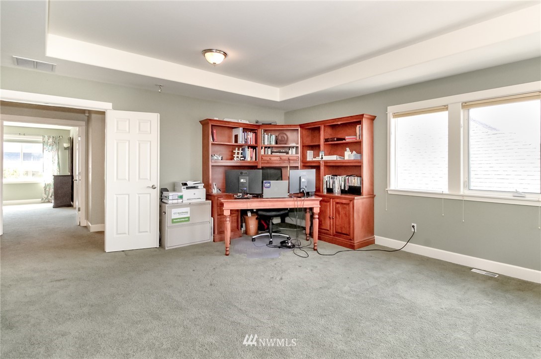 727 South 37th Place Renton, WA 98055 - Photo 22 of 28 a view of an empty room with window and workspace