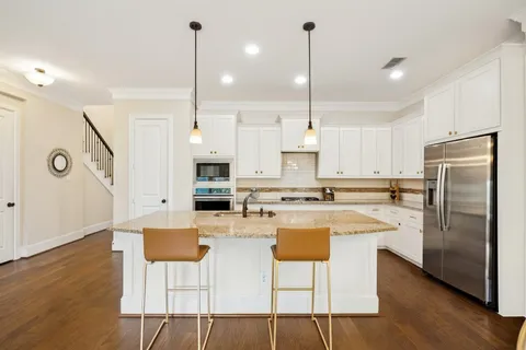 a dining room with furniture window wooden floor
