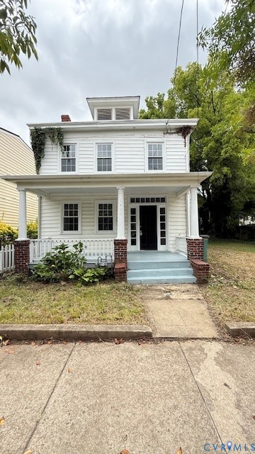 1424 Decatur Street Richmond, VA 23224 - Photo 2 of 28 Two-story residence with a front porch, white sidi
