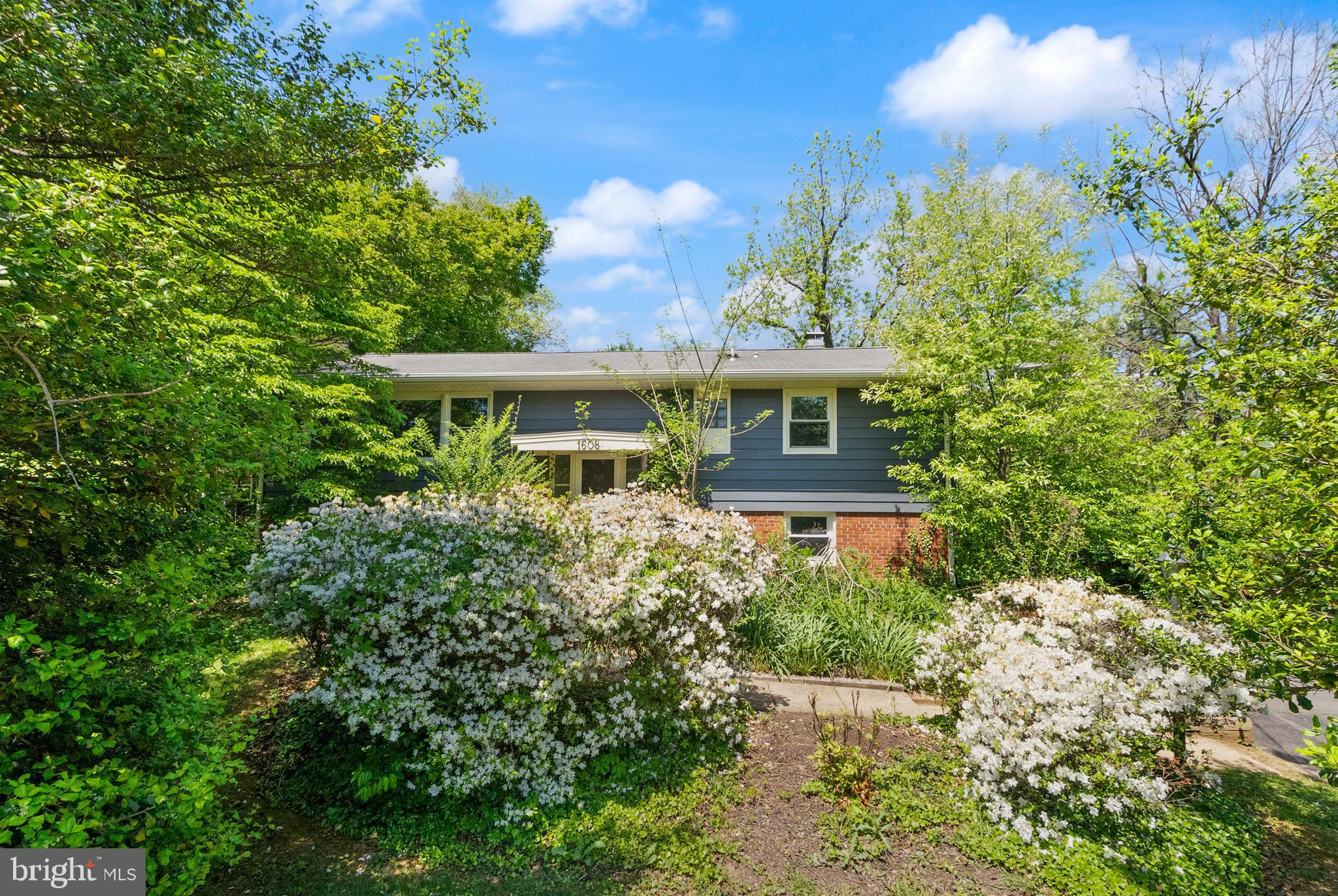 1608 Chain Bridge Road McLean, VA 22101 - Photo 11 of 37 a view of a house with a yard