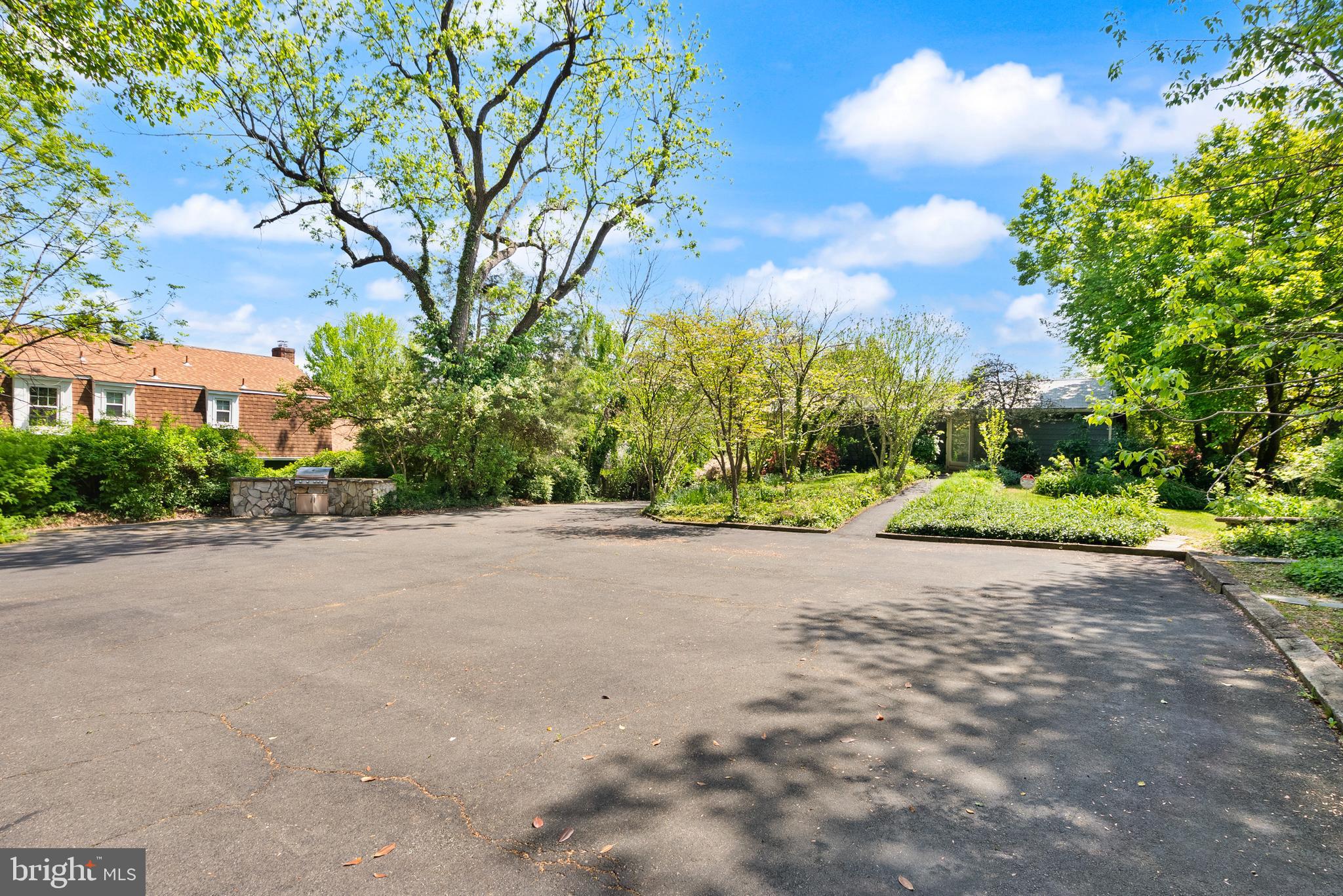 1608 Chain Bridge Road McLean, VA 22101 - Photo 22 of 37 a view of a street with a yard