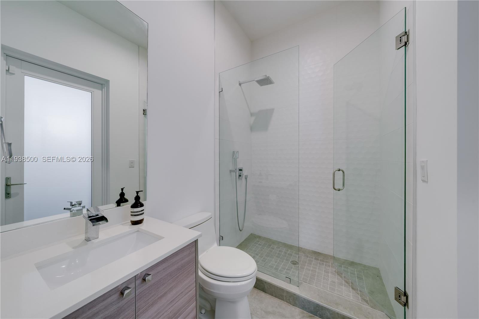 3072 Indiana Street, Unit 3072 Coconut Grove, FL 33133 - Photo 24 of 51 a bathroom with a sink toilet and shower
