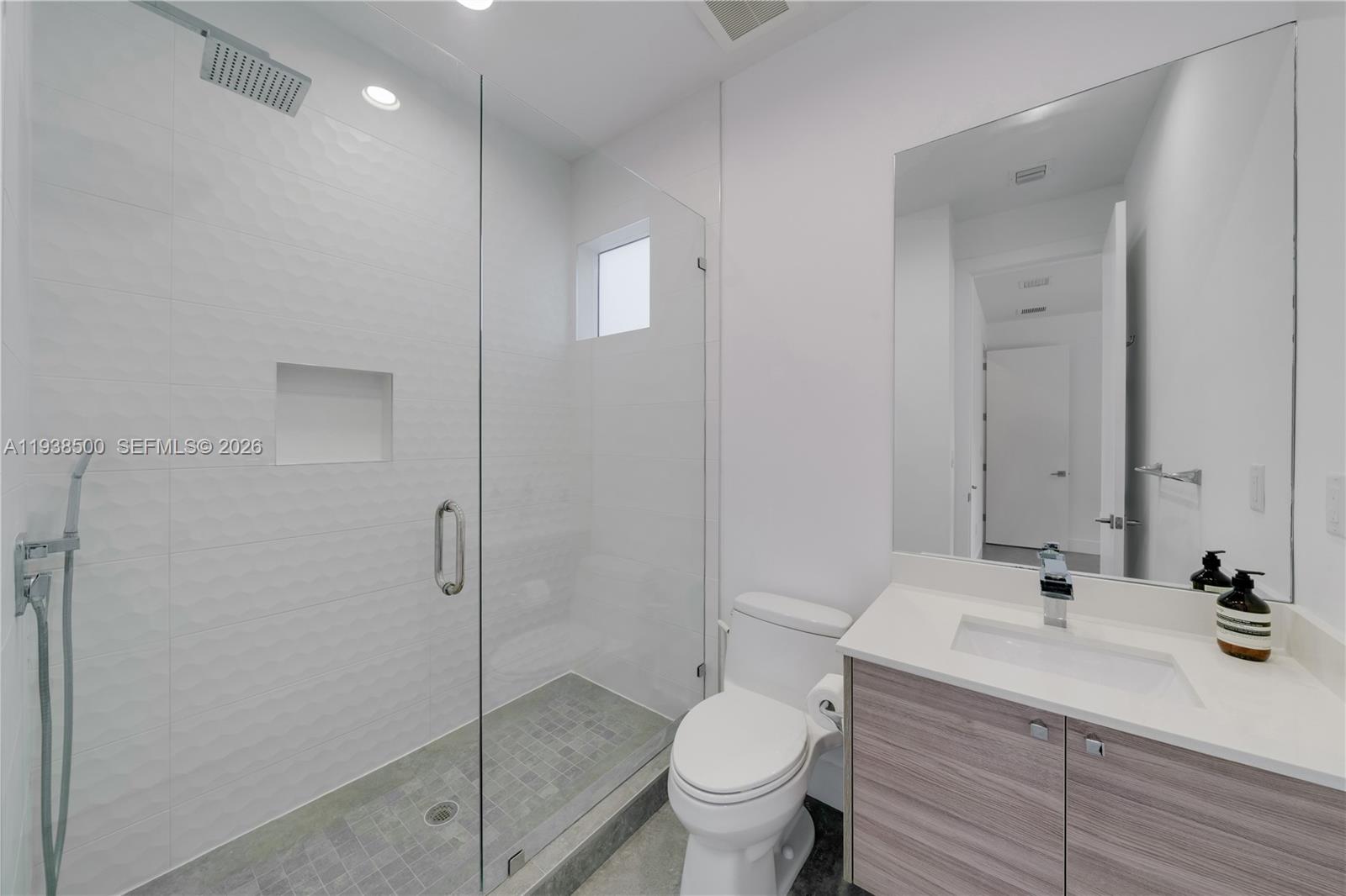 3072 Indiana Street, Unit 3072 Coconut Grove, FL 33133 - Photo 29 of 51 a bathroom with a sink toilet and shower