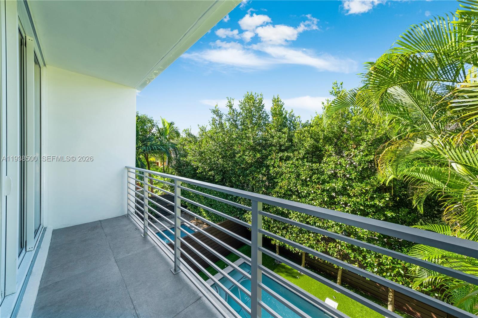 3072 Indiana Street, Unit 3072 Coconut Grove, FL 33133 - Photo 39 of 51 a balcony with trees in the back
