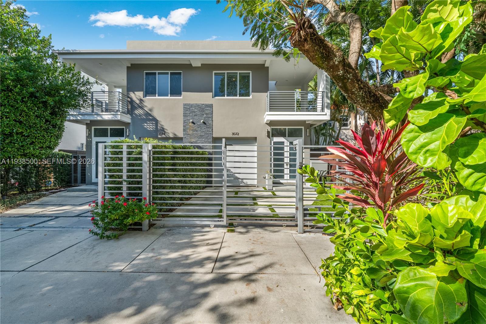 3072 Indiana Street, Unit 3072 Coconut Grove, FL 33133 - Photo 48 of 51 a front view of a house with garden