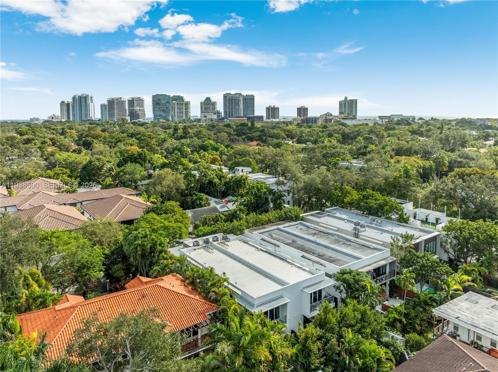 3072 Indiana Street, Unit 3072 Coconut Grove, FL 33133 - Photo 50 of 51 an aerial view of a residential apartment building with a yard and plants
