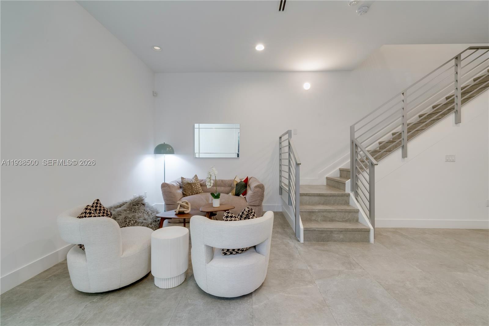 3072 Indiana Street, Unit 3072 Coconut Grove, FL 33133 - Photo 6 of 51 a living room with furniture and a painting